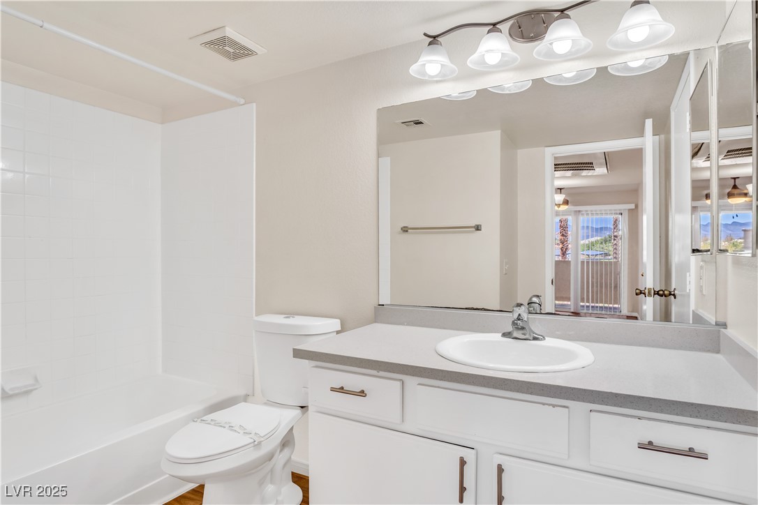 2300 East Silverado Ranch Boulevard, Unit 2003 Las Vegas, NV 89123 - Photo 9 of 19 Full bath featuring vanity and shower / washtub combination