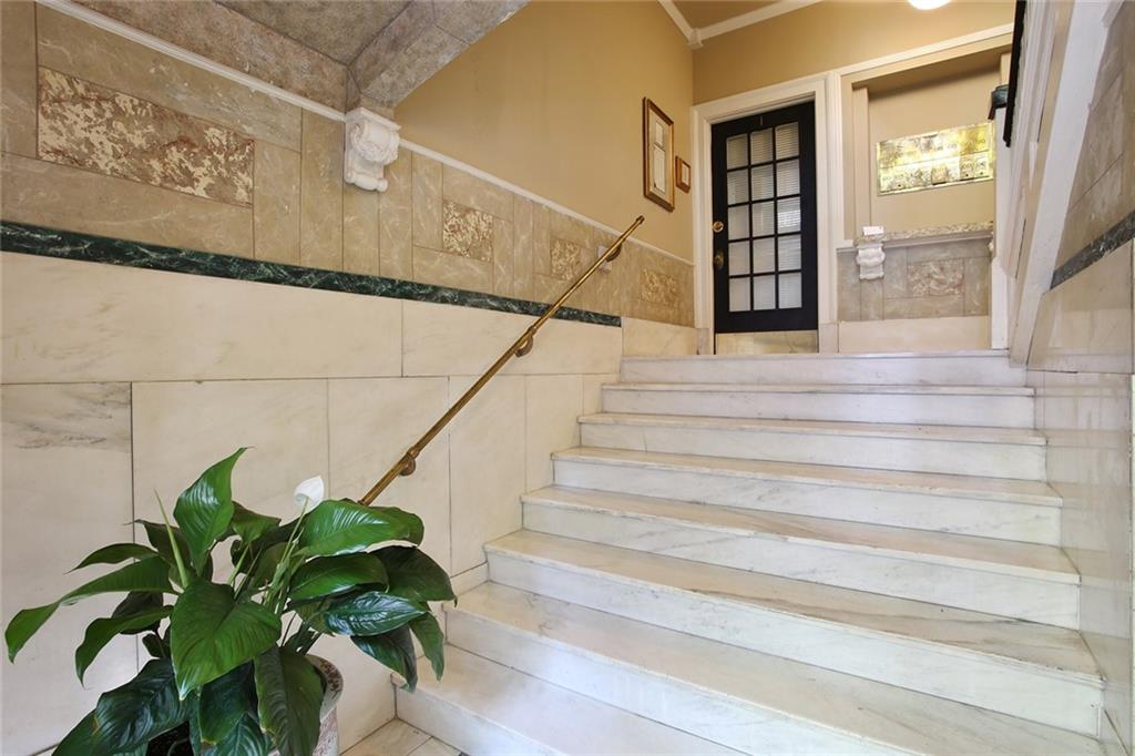 These original marble steps remind me of Europe. #3 is located on the 2nd level. You will only have 6 neighbors as there are only 7 homes at The Desoto.