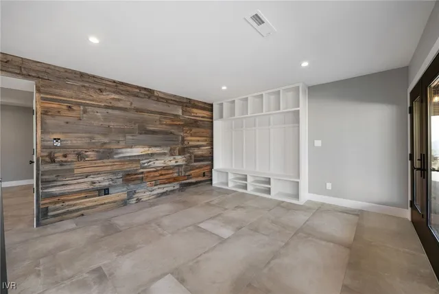 a view of an entryway with wooden floor