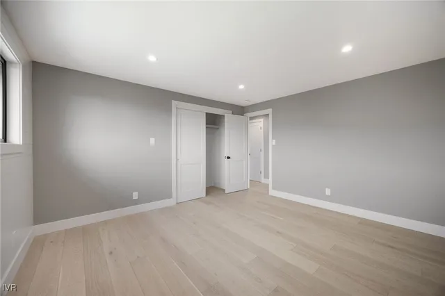 a view of a beach with a mountain in the background