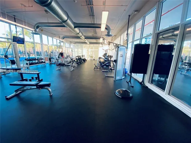 a view of swimming pool with seating area