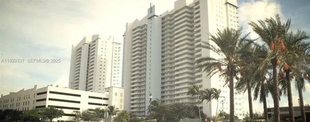 a view of a city with tall buildings