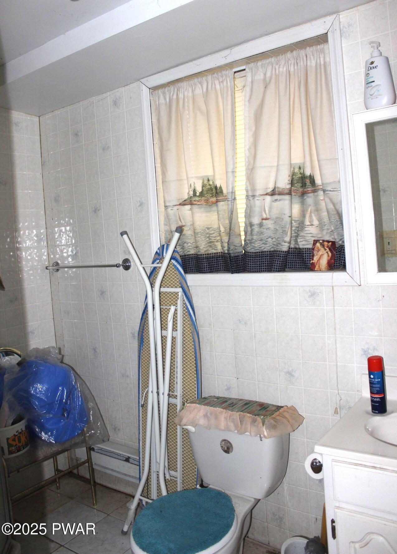 30 Brookfield Road, Unit LOT 1259 Lake Ariel, PA 18436 - Photo 14 of 32 a bathroom with a toilet and a shower