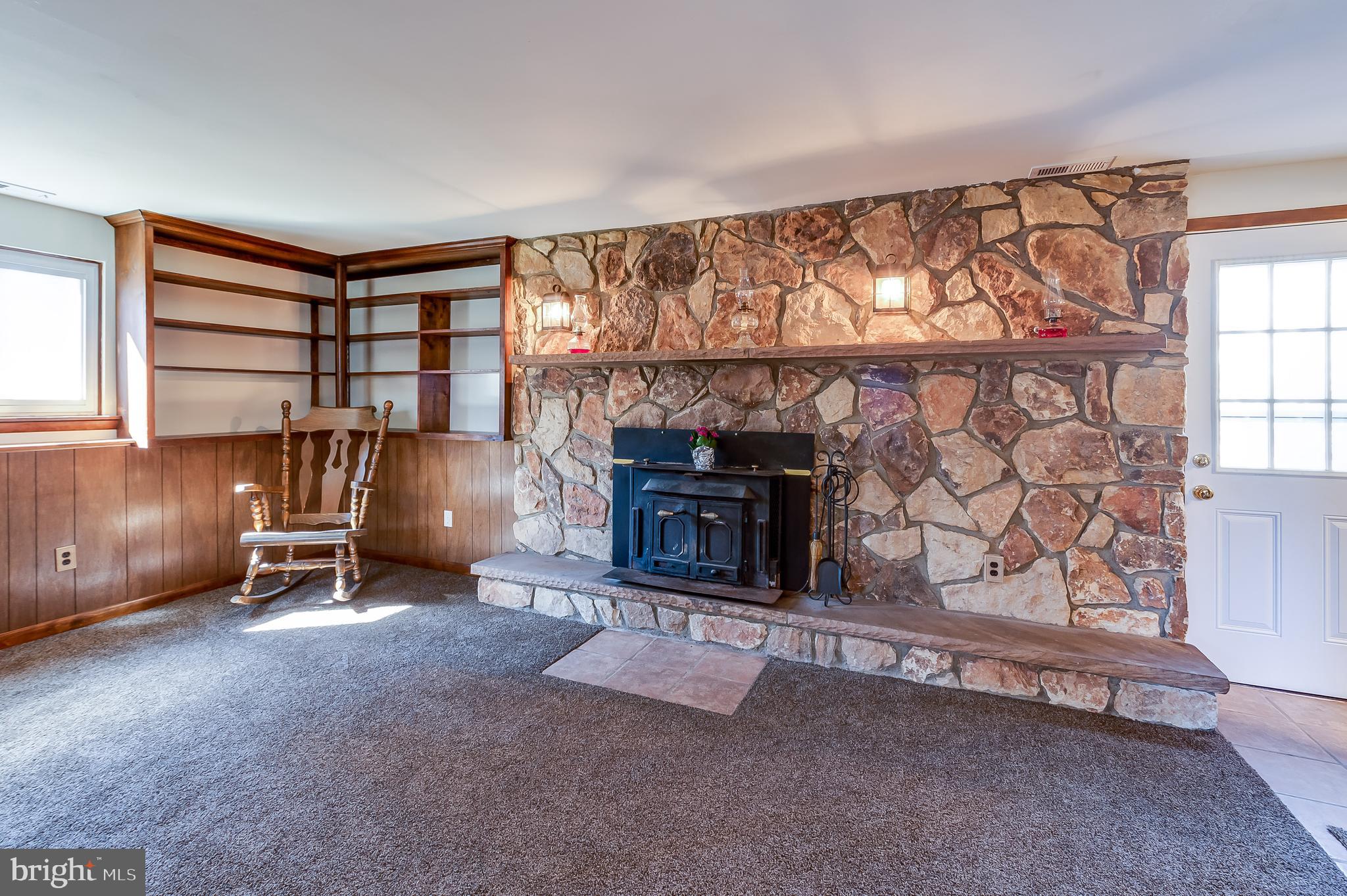 65 Richter Road Tabernacle, NJ 08088 - Photo 21 of 38 Brick Fireplace with Buck wood stove insert