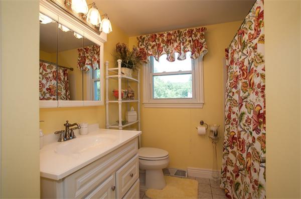 227 West Meadow Road Lowell, MA 01854 - Photo 14 of 25 a bathroom with a sink toilet and shower