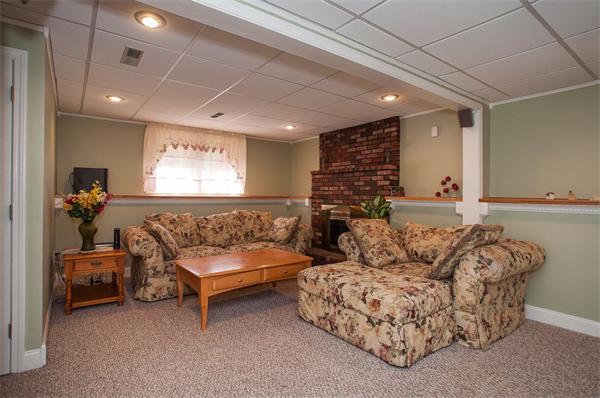 227 West Meadow Road Lowell, MA 01854 - Photo 17 of 25 a living room with furniture and a large window