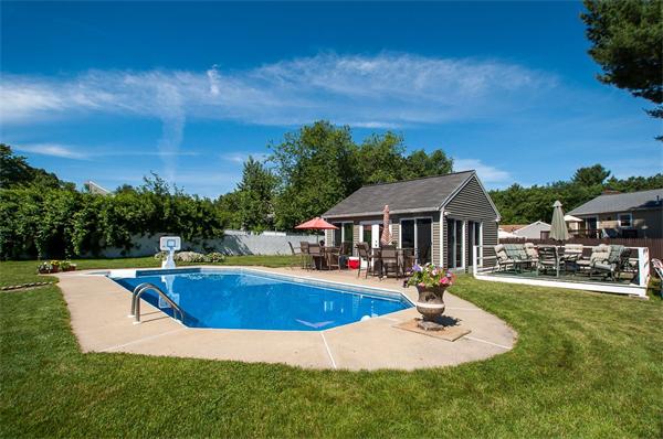 227 West Meadow Road Lowell, MA 01854 - Photo 21 of 25 a view of a house with swimming pool and sitting area