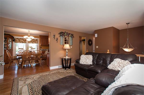 227 West Meadow Road Lowell, MA 01854 - Photo 10 of 25 a living room with furniture and wooden floor