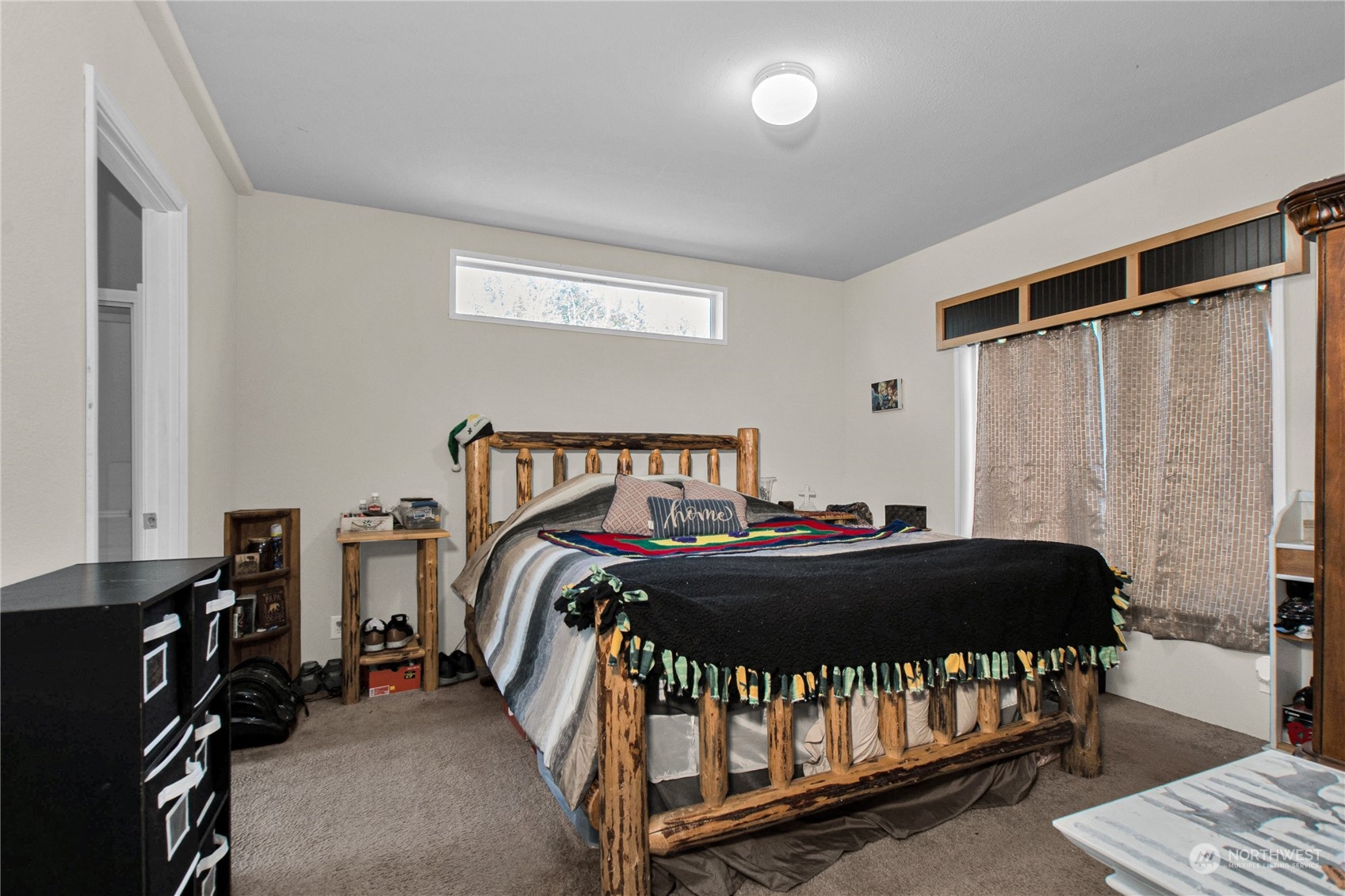 446-67 Meier Road Winlock, WA 98596 - Photo 14 of 33 a bedroom with a bed and a window