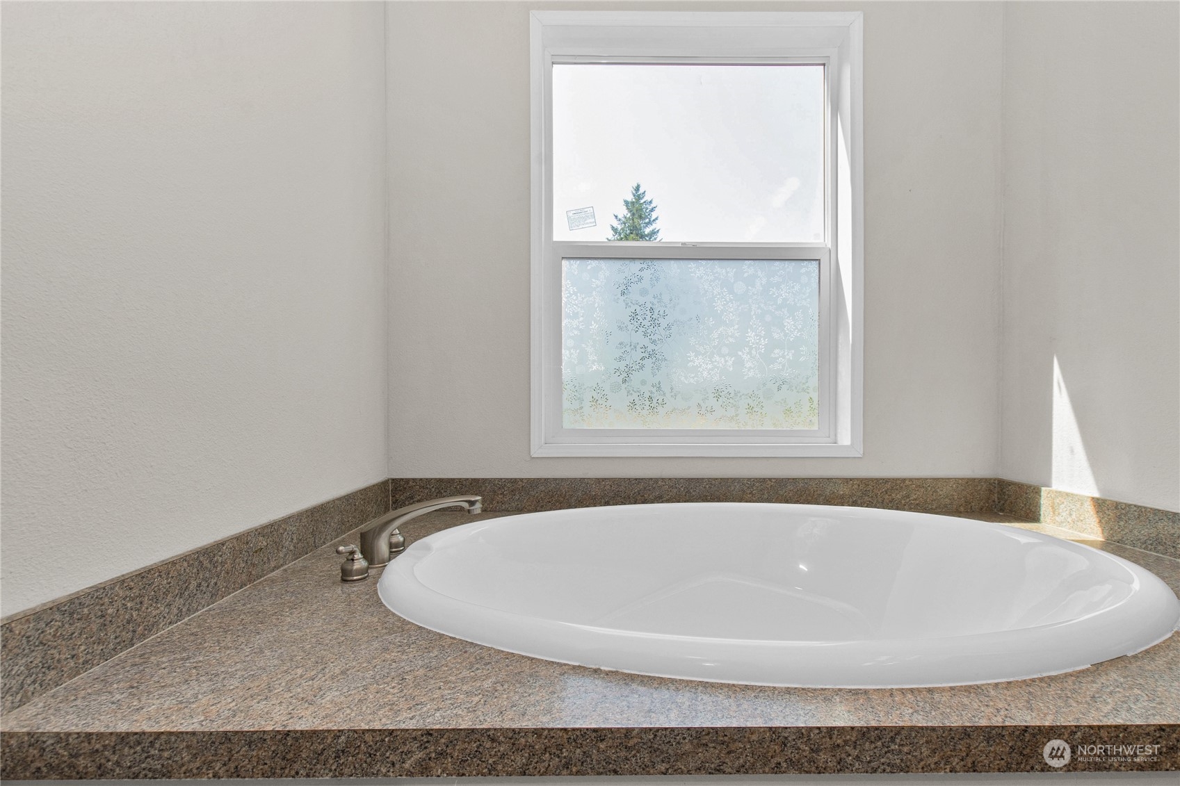 446-67 Meier Road Winlock, WA 98596 - Photo 17 of 33 a white bath tub sitting in a bathroom