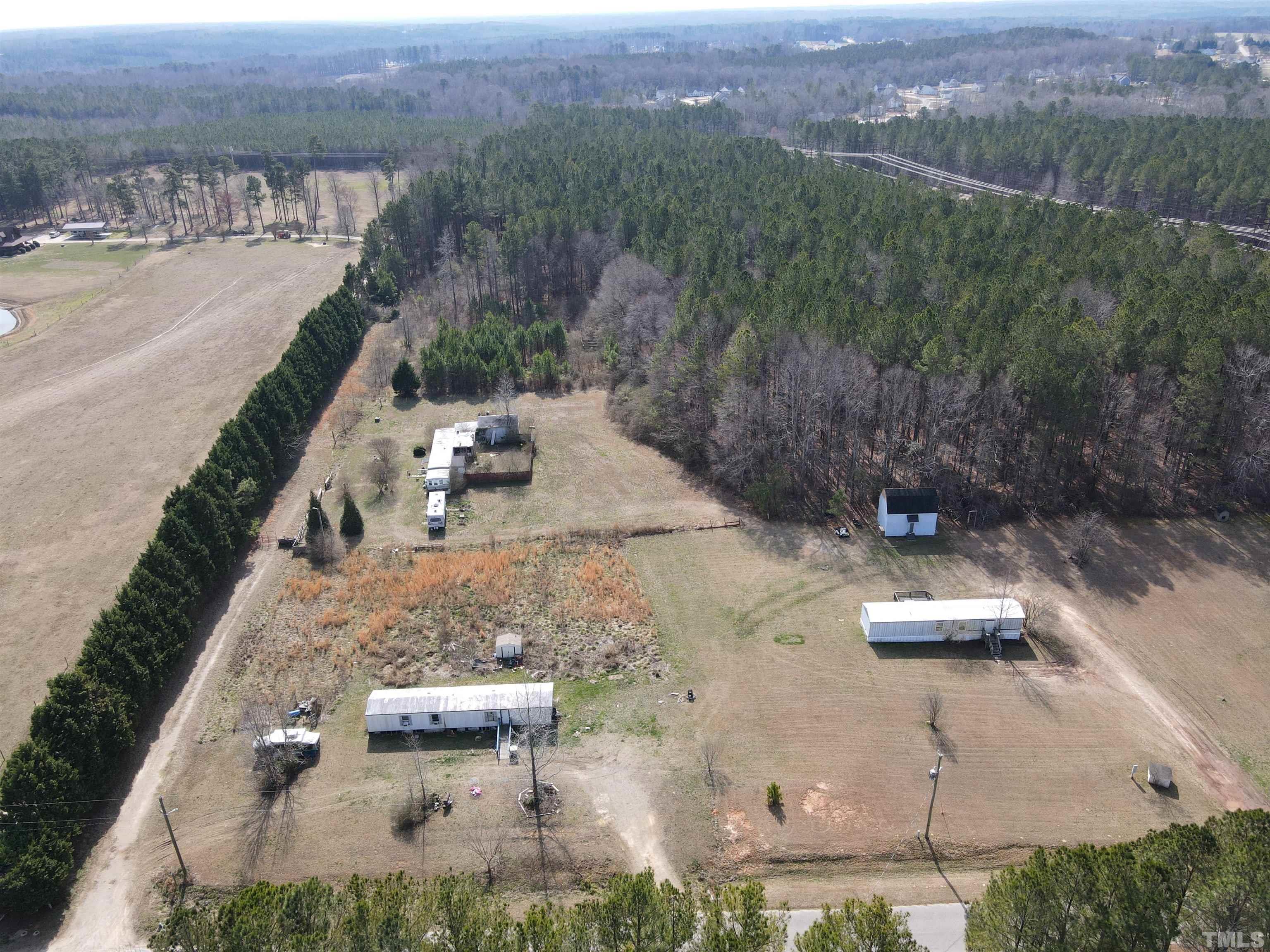 0 Rice Road Zebulon, NC 27597 - Photo 2 of 5 an aerial view of a house with a yard basket ball court