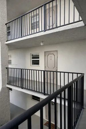 a view of staircase from a balcony