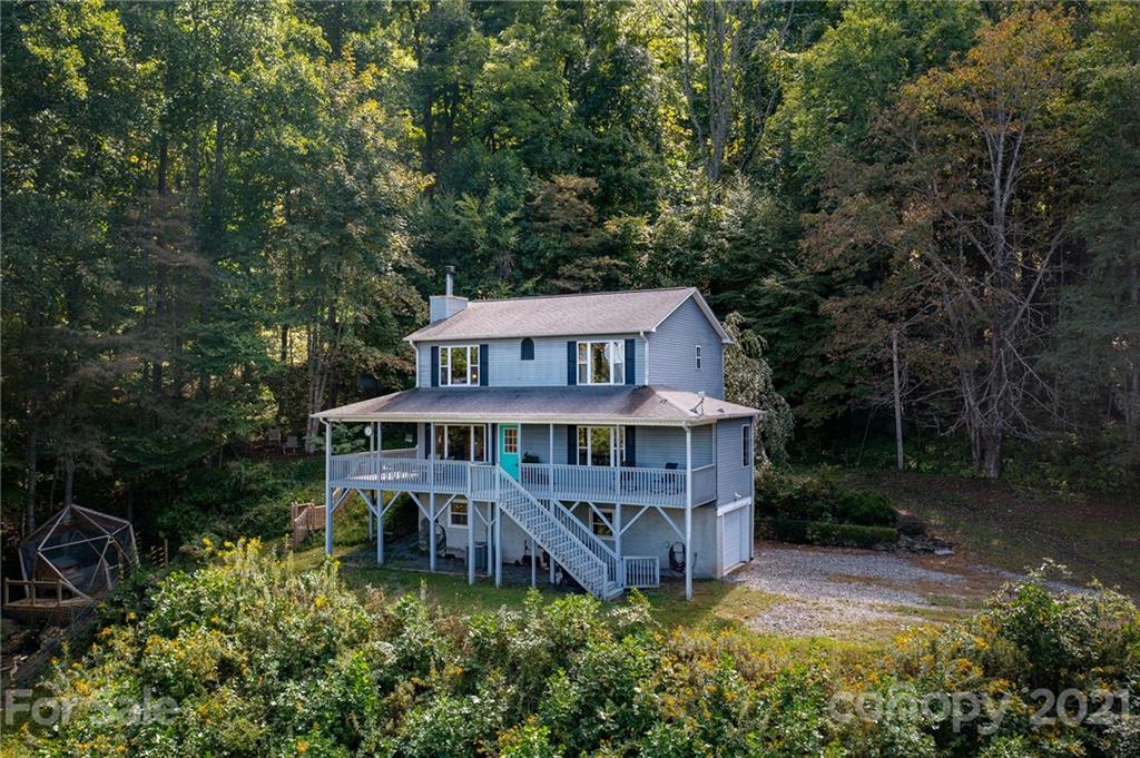 1747 Secluded Valley Road Marshall, NC 28753 - Photo 1 of 33 front view of a house with a yard