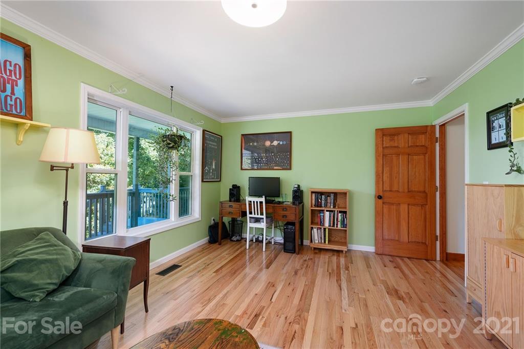 1747 Secluded Valley Road Marshall, NC 28753 - Photo 13 of 33 a living room with furniture and a wooden floor