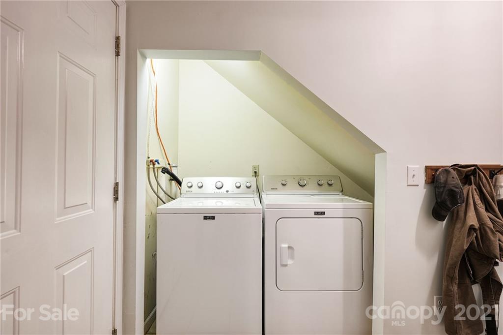 1747 Secluded Valley Road Marshall, NC 28753 - Photo 19 of 33 a utility room with dryer and washer