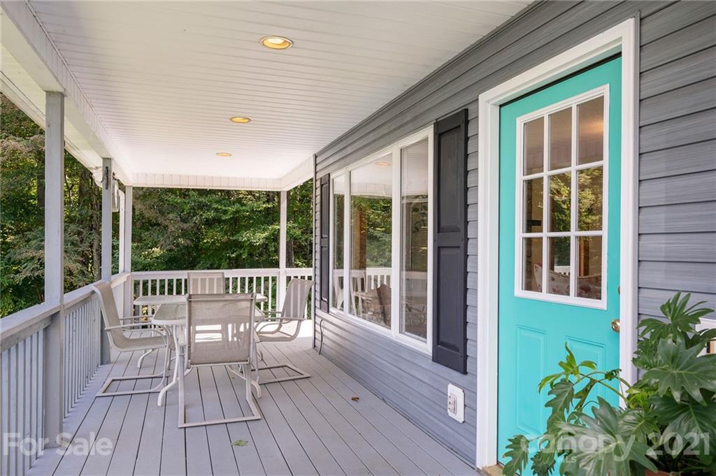 1747 Secluded Valley Road Marshall, NC 28753 - Photo 22 of 33 a view of a house with a porch