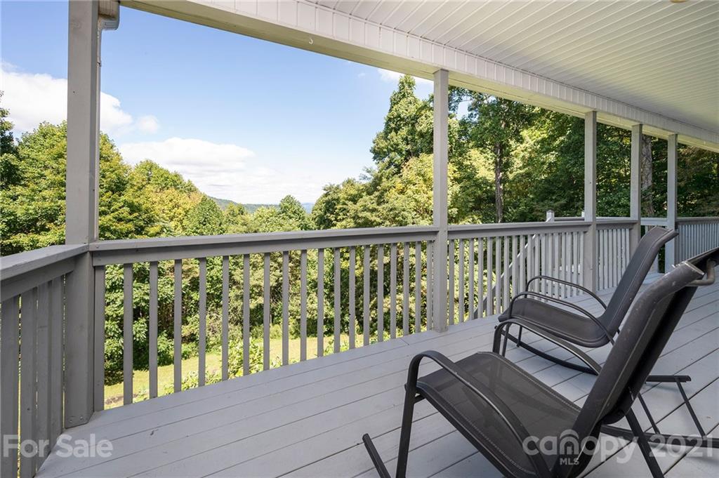 1747 Secluded Valley Road Marshall, NC 28753 - Photo 23 of 33 a view of a two chairs in the deck