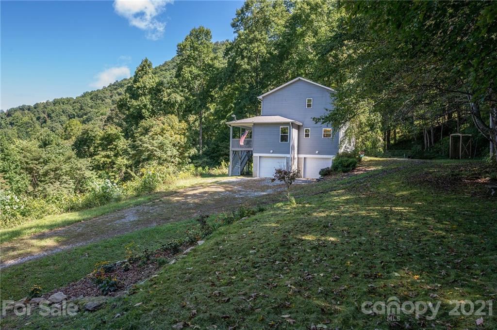 1747 Secluded Valley Road Marshall, NC 28753 - Photo 32 of 33 a house view with a outdoor space