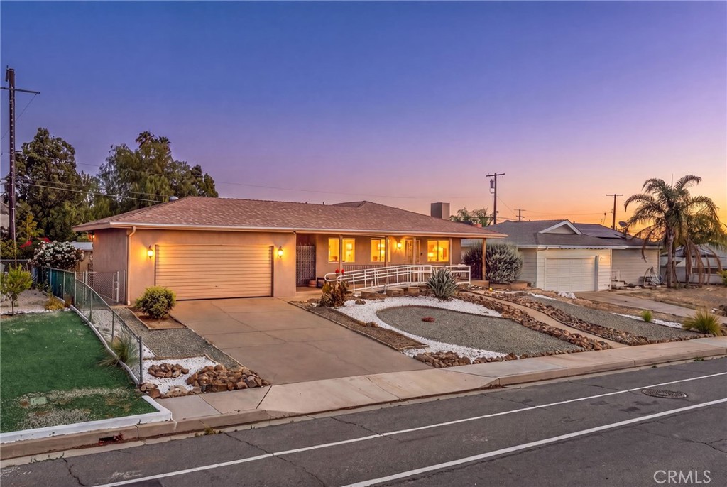 29078 Bradley Road Menifee, CA 92586 - Photo 3 of 42 a view of a house with cars park