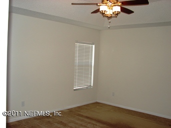10645 Spring View Road Jacksonville, FL 32221 - Photo 9 of 10 a view of a window in a room