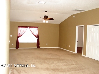 10645 Spring View Road Jacksonville, FL 32221 - Photo 10 of 10 a view of an empty room with a window