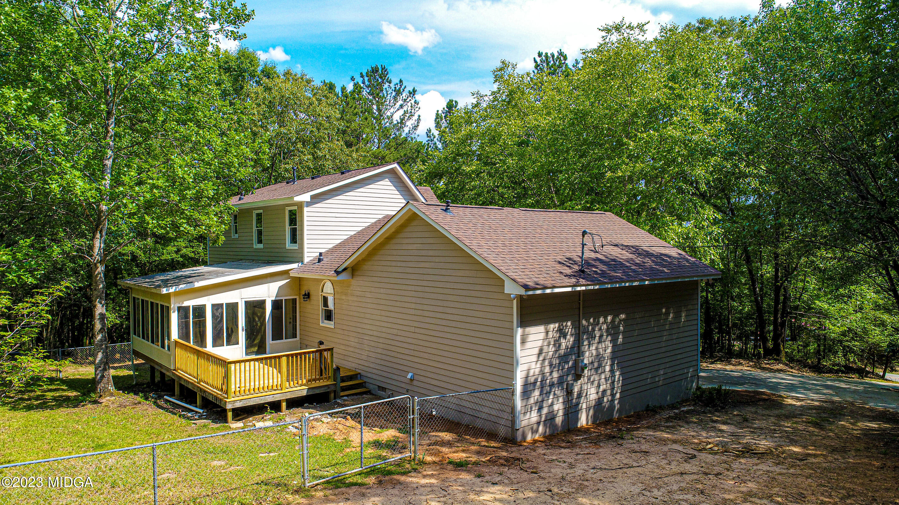 2818 Pea Ridge Road Juliette, GA 31046 - Photo 13 of 71 a view of a house with a yard