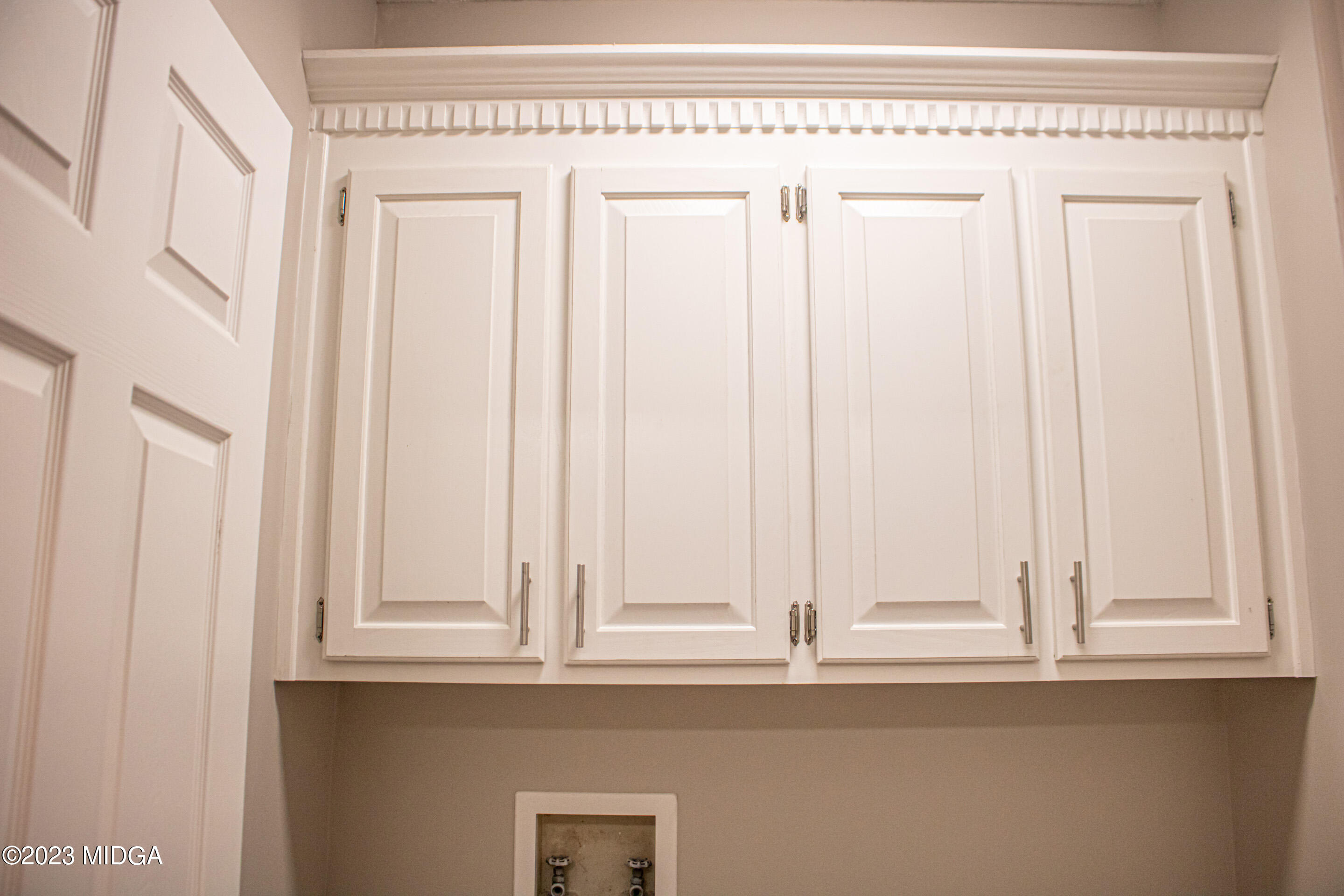 2818 Pea Ridge Road Juliette, GA 31046 - Photo 32 of 71 a view of white cabinets and a window