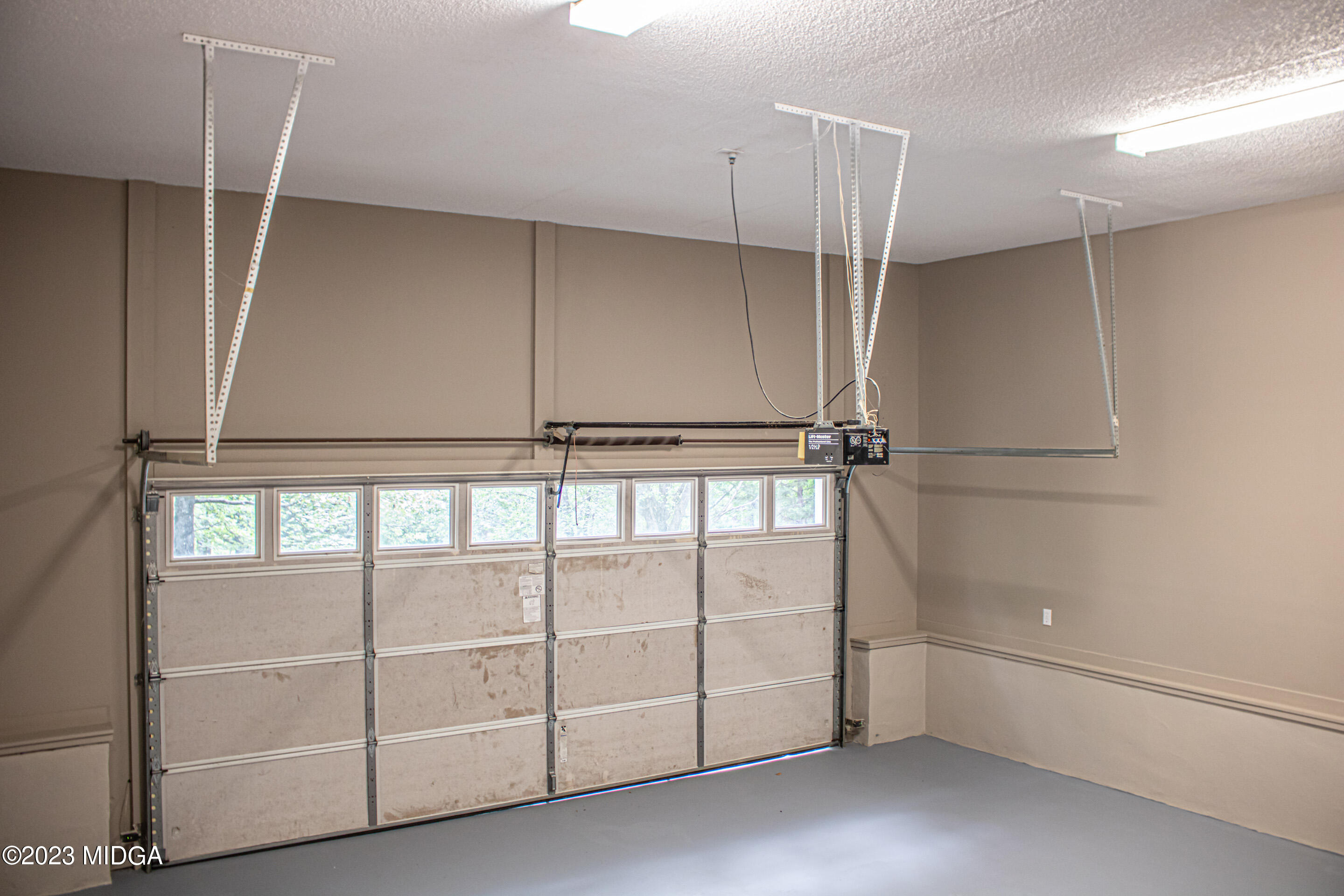 2818 Pea Ridge Road Juliette, GA 31046 - Photo 45 of 71 a view of an empty room with a window