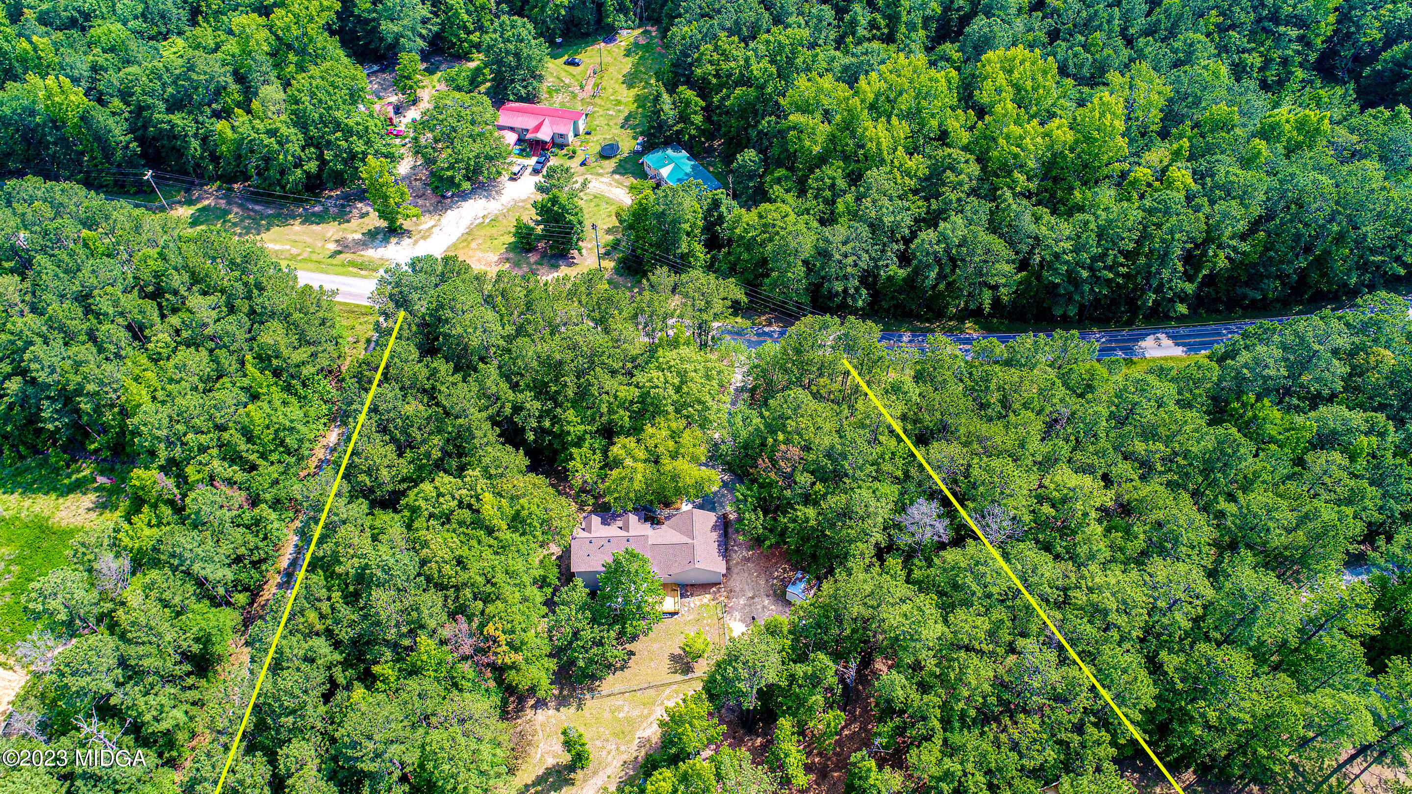2818 Pea Ridge Road Juliette, GA 31046 - Photo 64 of 71 an aerial view of residential house with outdoor space and trees all around