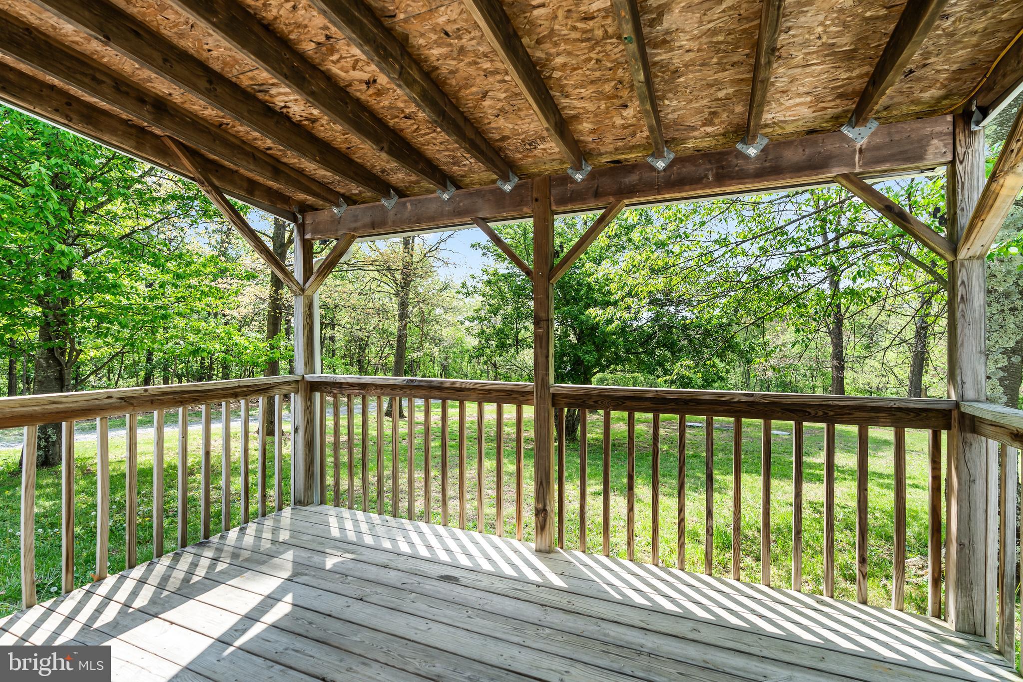 1217 Nestle Quarry Road Falling Waters, WV 25419 - Photo 16 of 52 a view of balcony with wooden floor