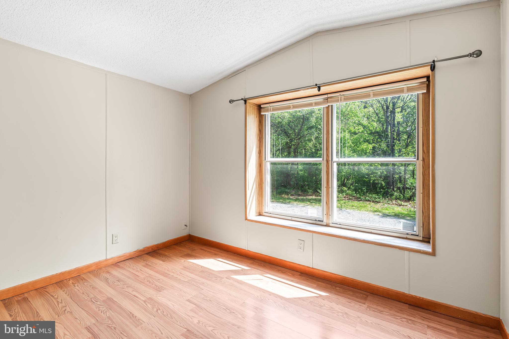 1217 Nestle Quarry Road Falling Waters, WV 25419 - Photo 34 of 52 an empty room with a window