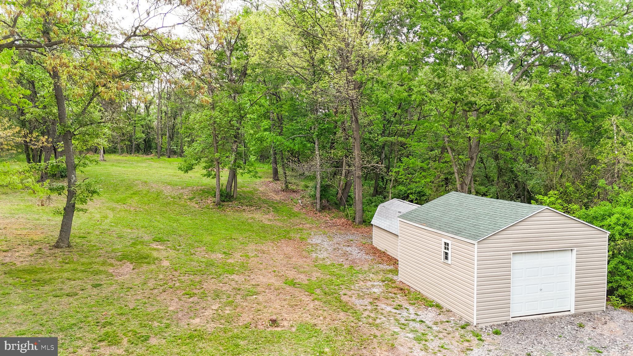 1217 Nestle Quarry Road Falling Waters, WV 25419 - Photo 47 of 52 a view of a house with a yard