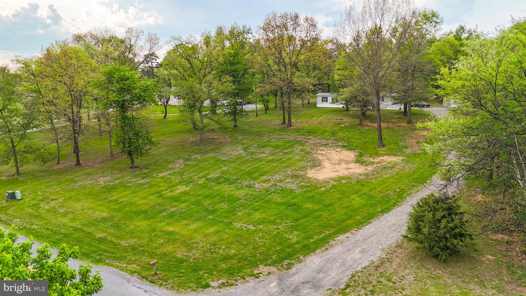 1217 Nestle Quarry Road Falling Waters, WV 25419 - Photo 50 of 52 a backyard of a house with lots of green space