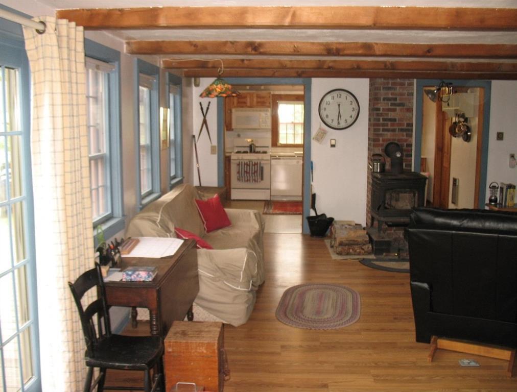 1573 Alna Road Alna, ME 04535 - Photo 11 of 32 Warm natural wood beams throughout.