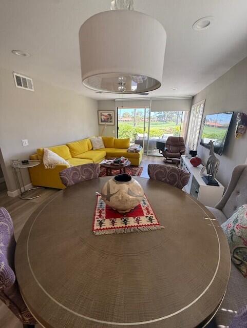 41 Sunrise Drive Rancho Mirage, CA 92270 - Photo 14 of 51 a living room with furniture and a large window