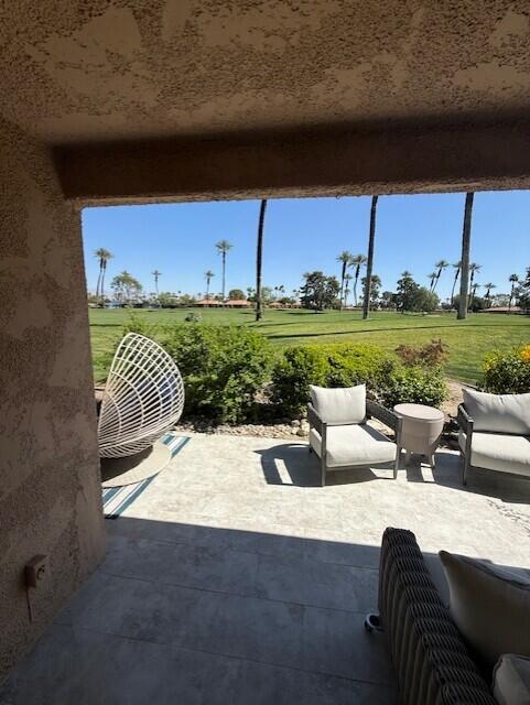 41 Sunrise Drive Rancho Mirage, CA 92270 - Photo 18 of 51 a view of swimming pool and outdoor seating