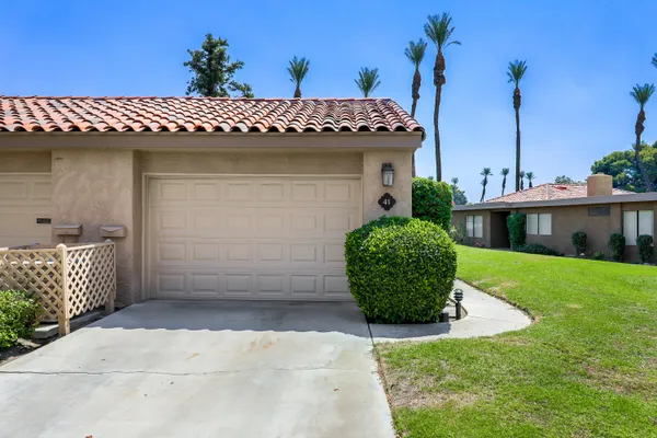 a view of a house with a garage