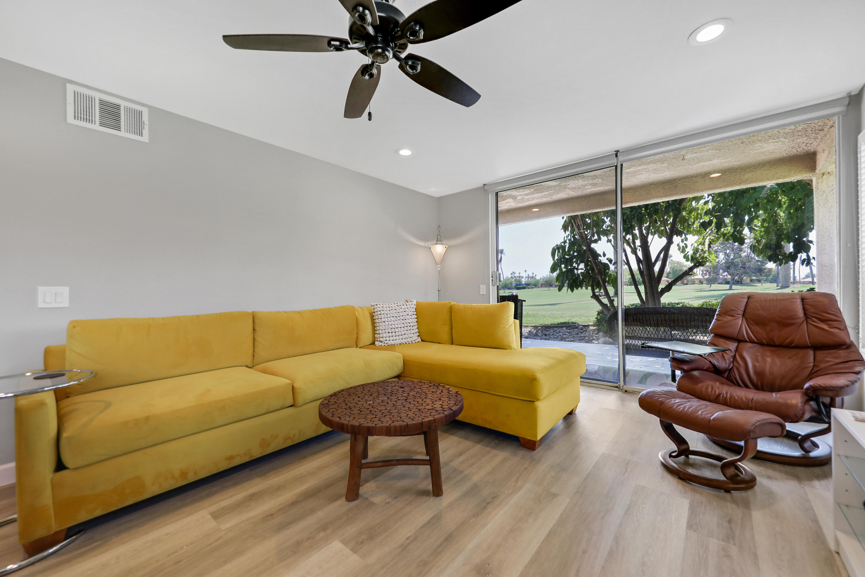 41 Sunrise Drive Rancho Mirage, CA 92270 - Photo 3 of 51 a living room with furniture and a large window