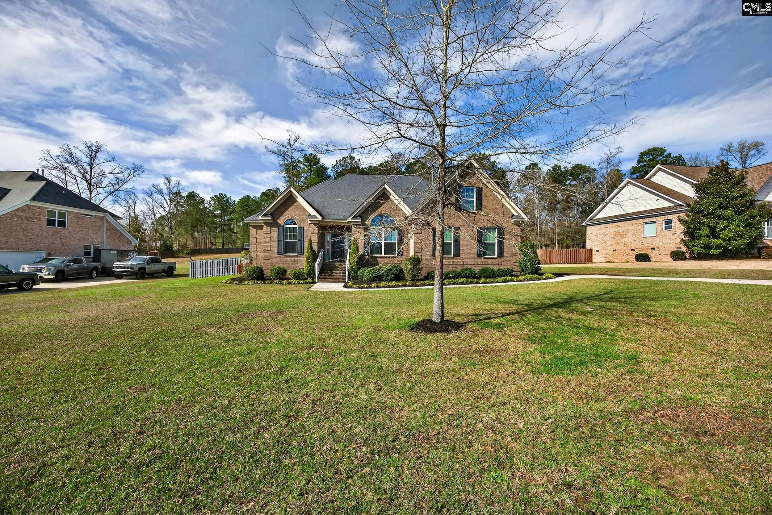 116 Renard Way Gilbert, SC 29054 - Photo 4 of 74 a house view with a garden space