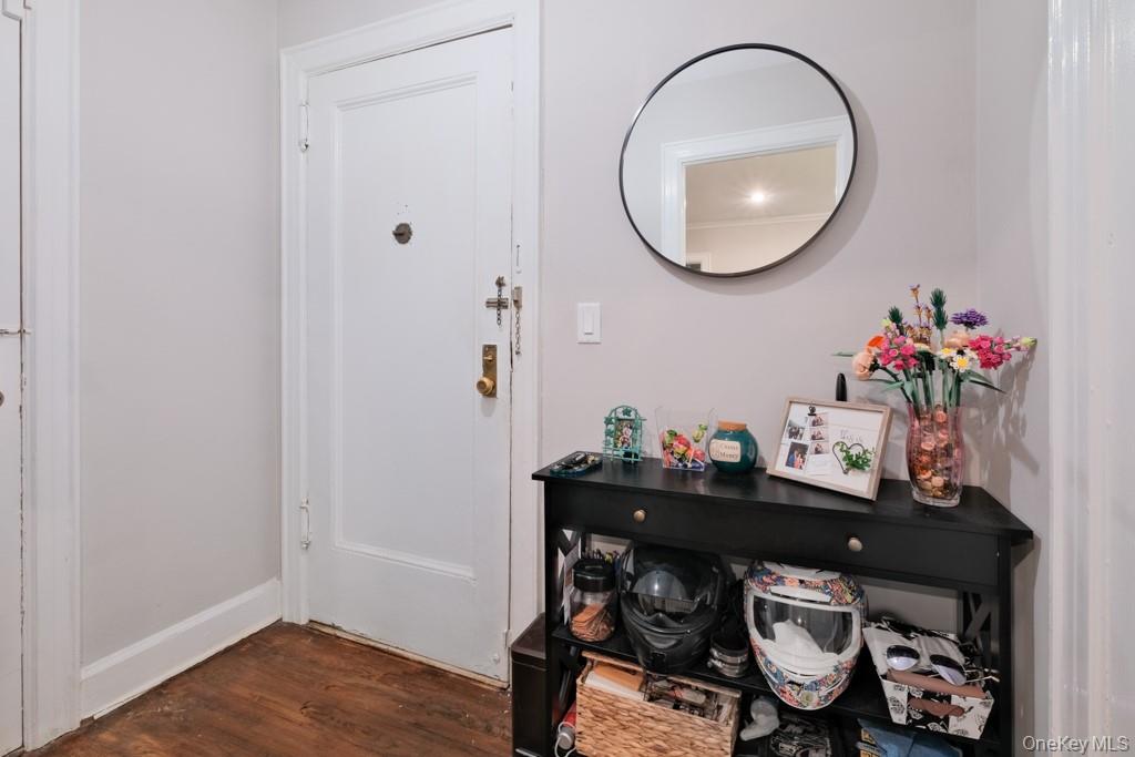 23 Old Mamaroneck Road, Unit 1M White Plains, NY 10605 - Photo 4 of 19 a bathroom with a sink mirror and vanity