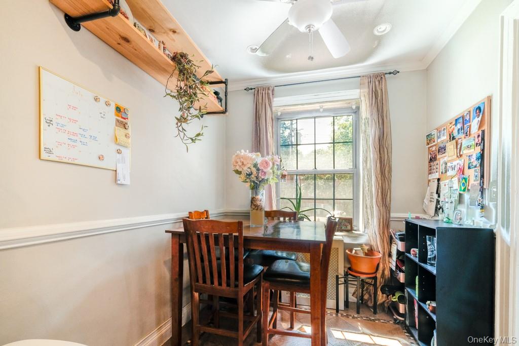 23 Old Mamaroneck Road, Unit 1M White Plains, NY 10605 - Photo 9 of 19 a dining room with furniture and window