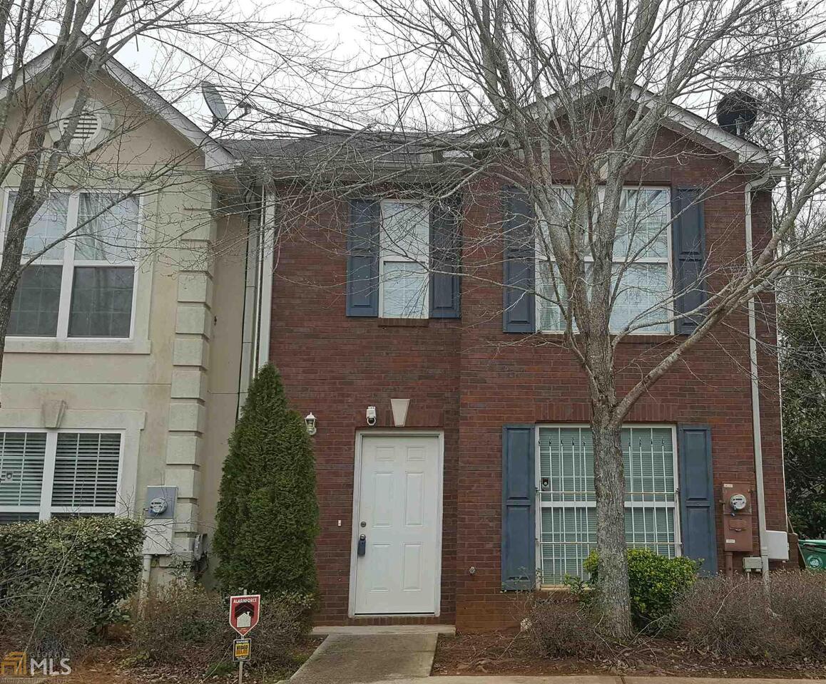 3364 Waldrop Trail Decatur, GA 30034 - Photo 1 of 1 a view of a brick house with a large windows and a large tree
