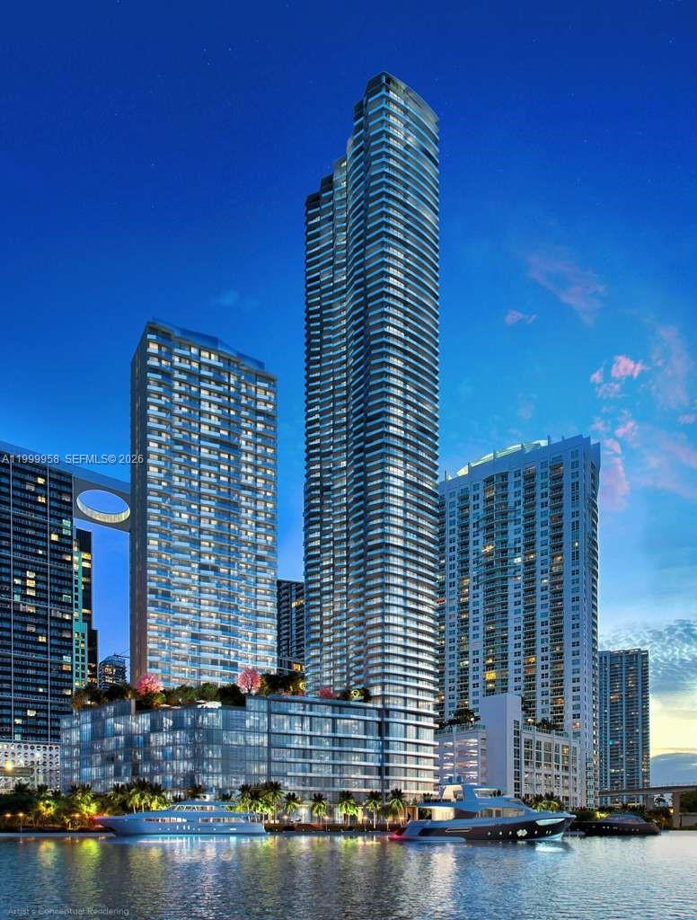 77 Southeast 5th Street, Unit 2905 Miami, FL 33131 - Photo 12 of 27 a front view of a building with street