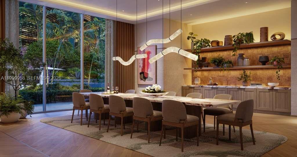 77 Southeast 5th Street, Unit 2905 Miami, FL 33131 - Photo 2 of 27 a view of a dining room with furniture window and outside view