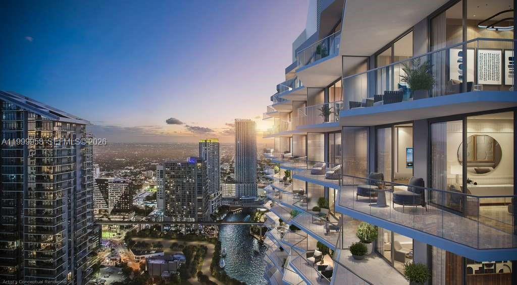 77 Southeast 5th Street, Unit 2905 Miami, FL 33131 - Photo 3 of 27 a view of a city with tall buildings