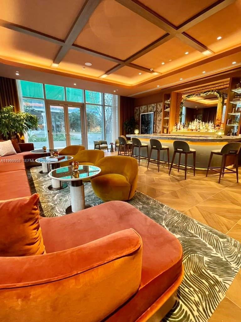 77 Southeast 5th Street, Unit 2905 Miami, FL 33131 - Photo 10 of 27 a outdoor space with seating area