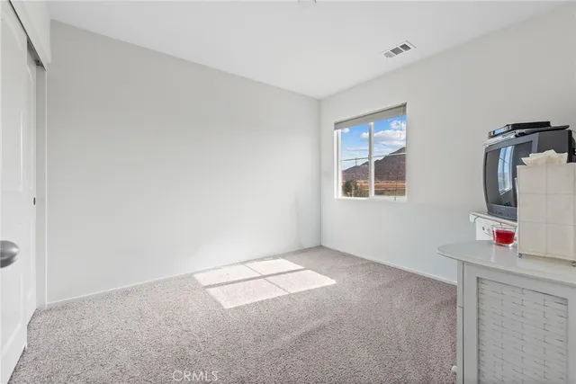 a view of a livingroom with furniture