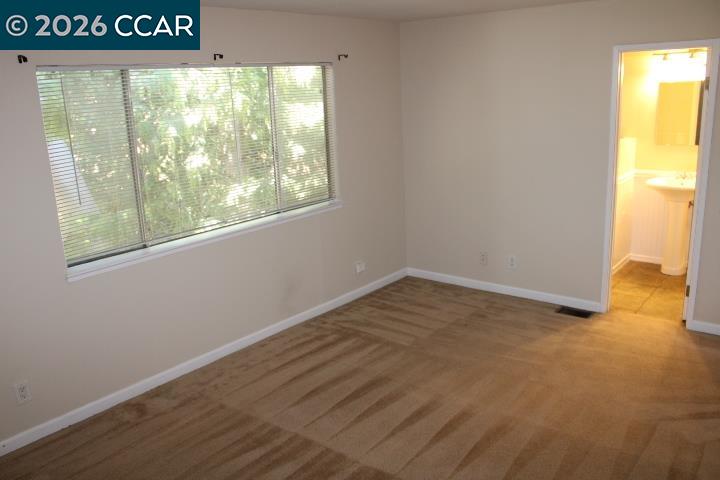 507 Chabre Court El Sobrante, CA 94803 - Photo 19 of 29 a view of an empty room with a window