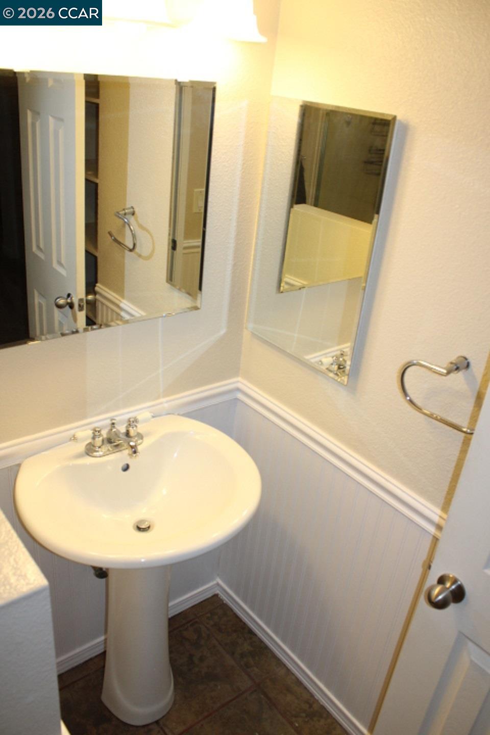 507 Chabre Court El Sobrante, CA 94803 - Photo 22 of 29 a bathroom with a sink and a mirror