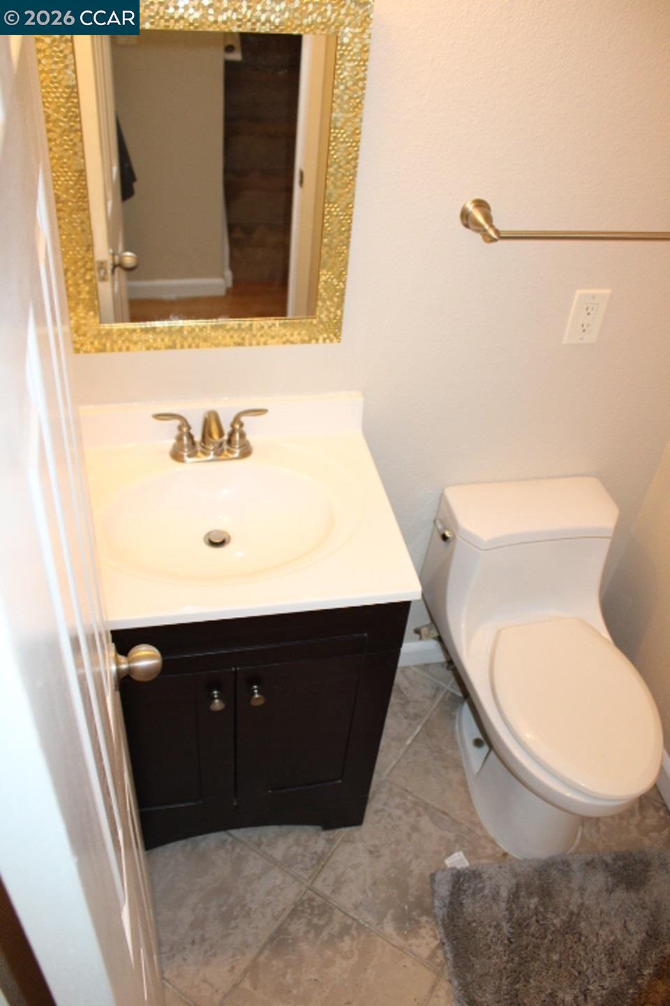 507 Chabre Court El Sobrante, CA 94803 - Photo 27 of 29 a bathroom with a sink and a toilet
